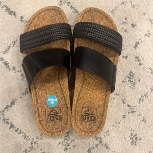 Reef Women’s Black and Tan Platform Slide Sandals